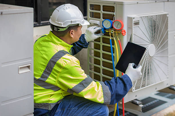 Professional Air Duct Cleaning technician working in Lyons, OR